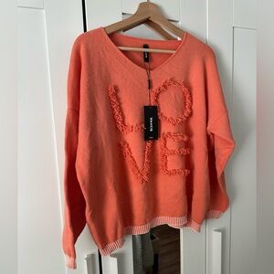Vibrant V-Neck Sweater with Textured Design